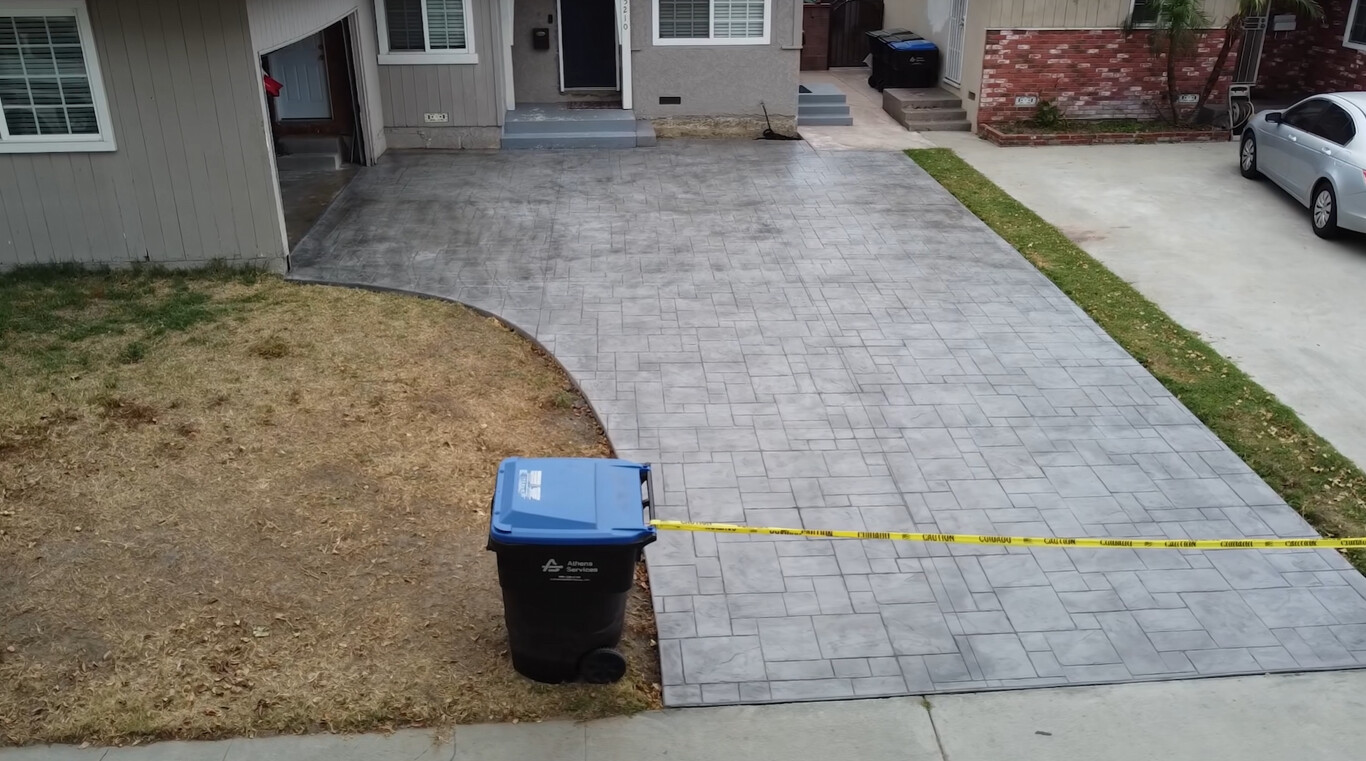 Professional stamped concrete driveway installation showing quality craftsmanship in Bridgeport, CT